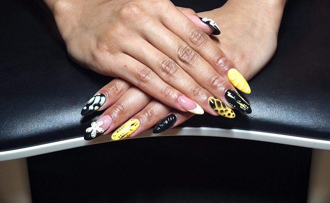 Black and yellow butterfly nail art